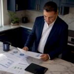 Home service business owner reviewing finances