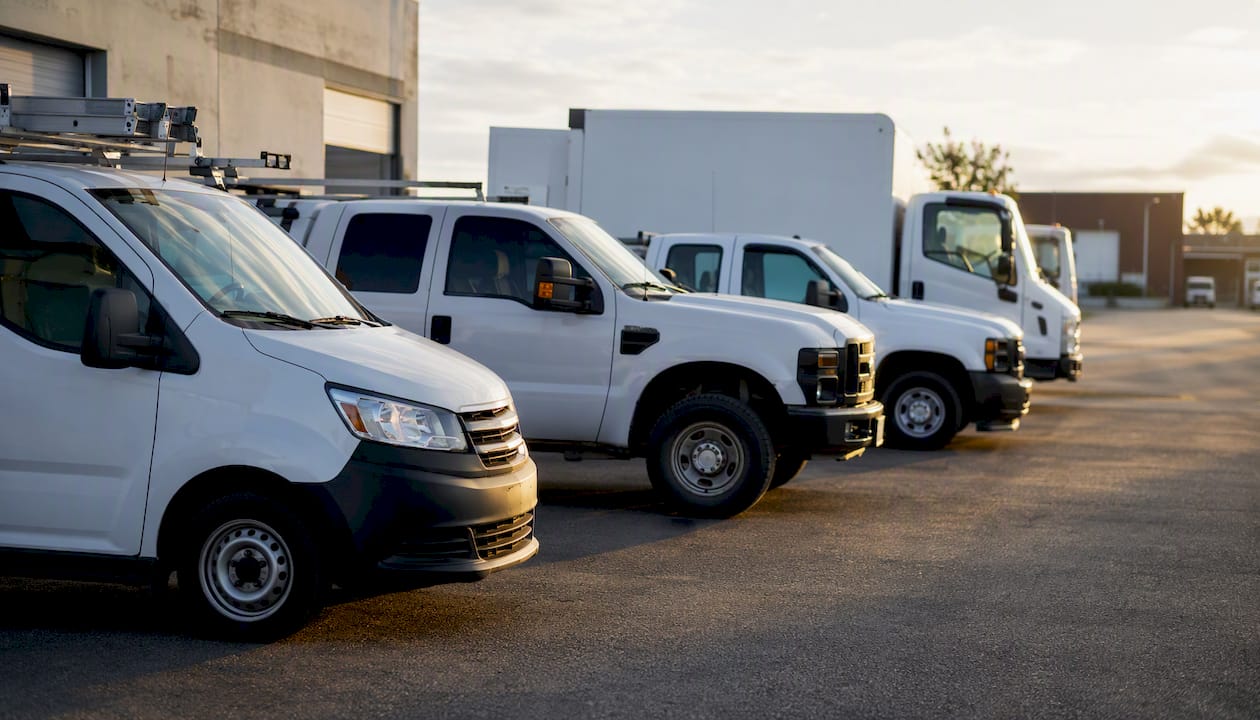 Work vehicle fleet parked in service yard