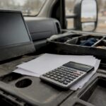 Service truck console with financial tools