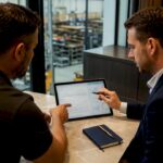 Owner and CFO reviewing service business finances
